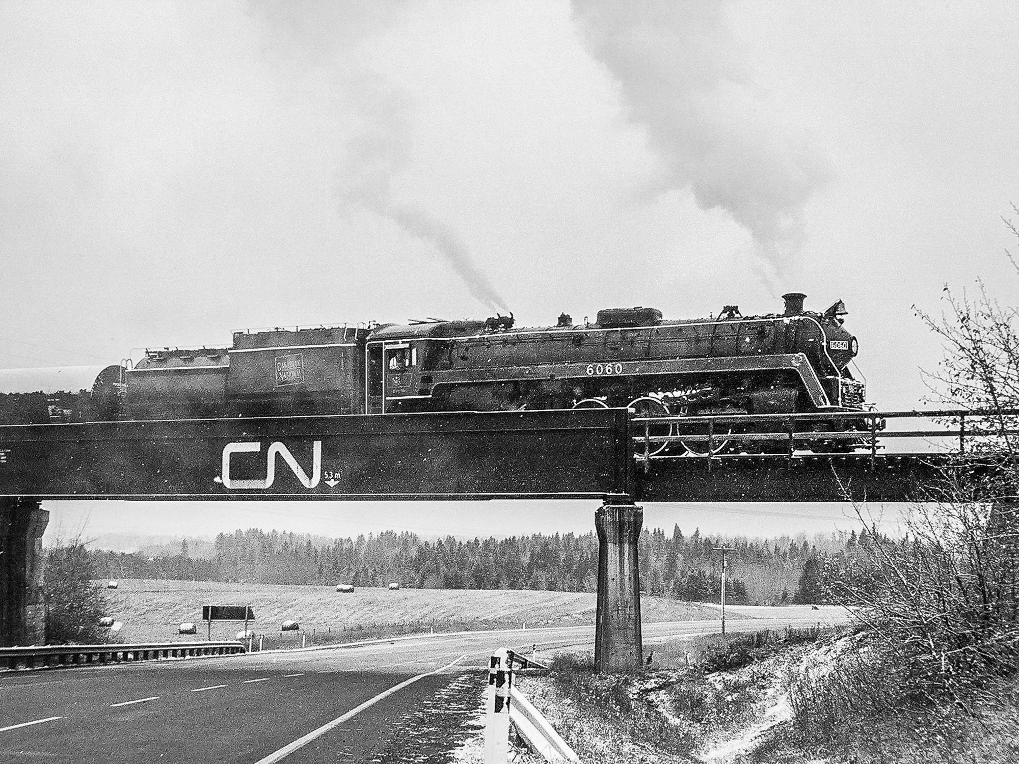 CN 6060 crosses Hwy 2A