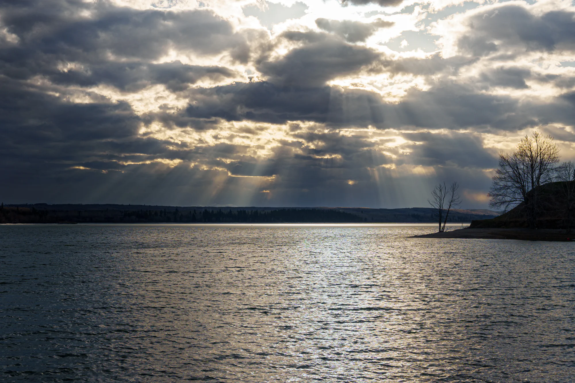 Cloudy sunset over the Glenmore Reservoir