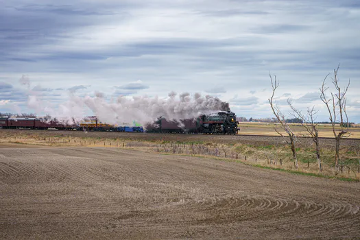 CP 2816 smokes up as it crosses Hwy 817
